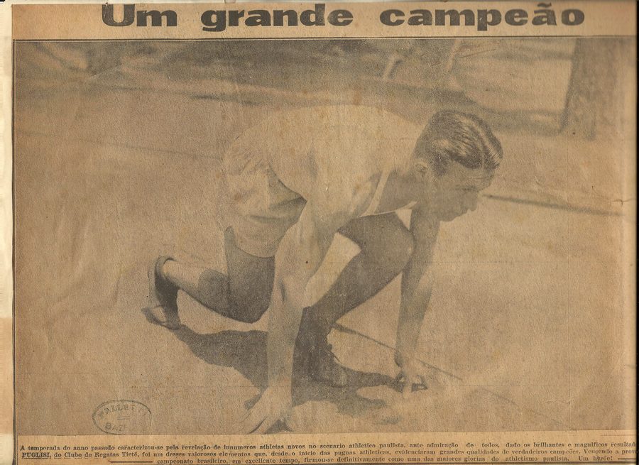Recorte histórico de imprensa sobre um campeão do atletismo, preservado no acervo da família Puglisi.