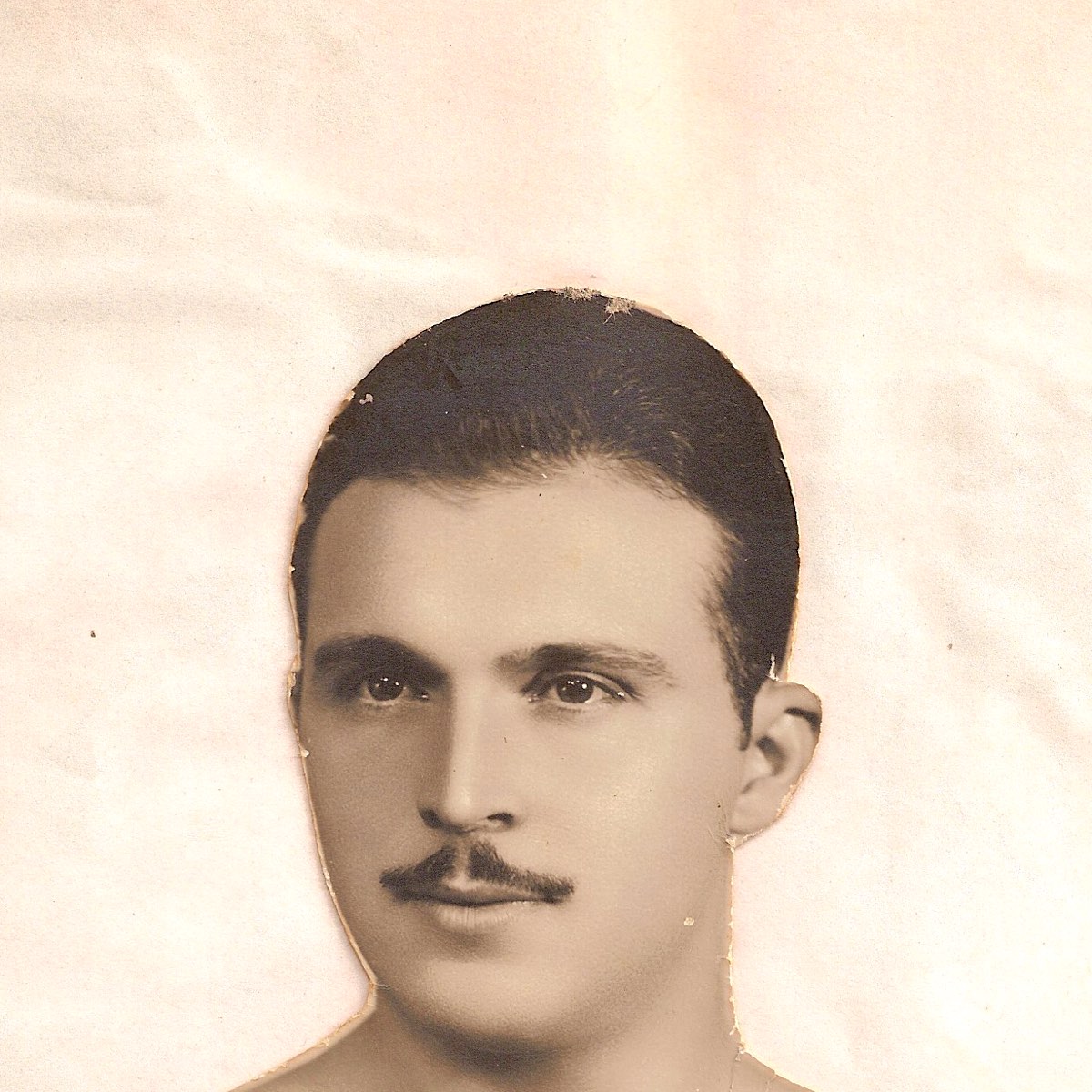 Retrato institucional histórico de Domingos Puglisi, do pescoço para cima.
